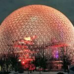 gold sphere landmark at night time